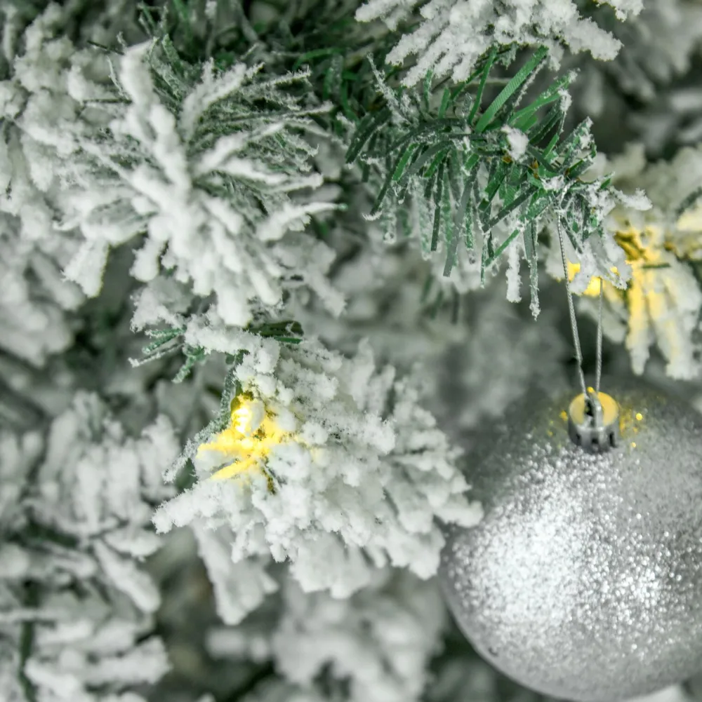 Pre-Lit Christmas Trees*The Holiday Aisle 9' H Slender Green/White Flocked/Frosted Christmas Tree With 350 Led Lights